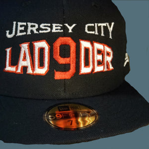 NEW Era 9FIFTY DEEP NAVY SNAPBACK w/ CITY OUTLINED front embroidery